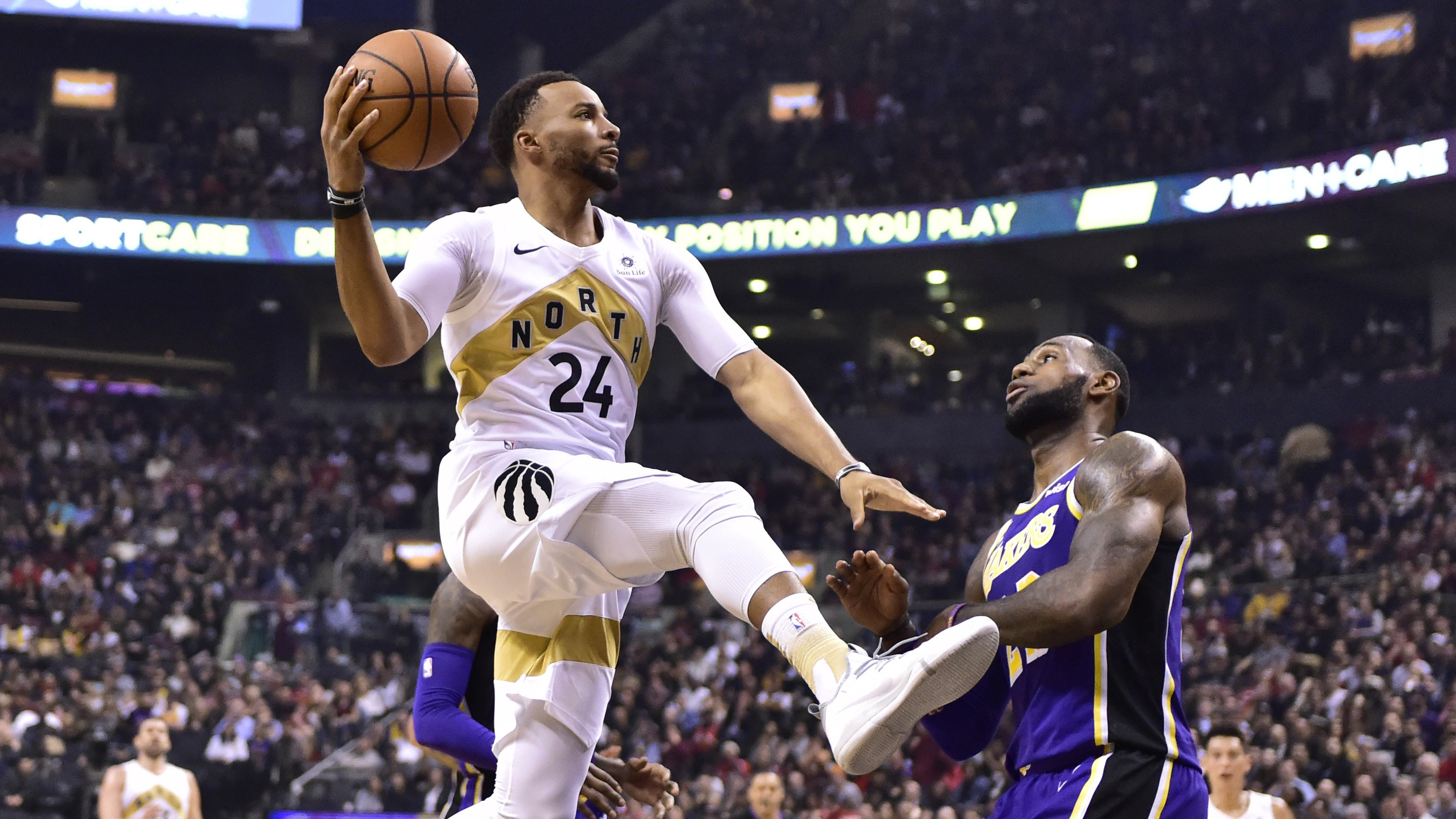 猛龙主场取胜布克乔感受季后赛的热度